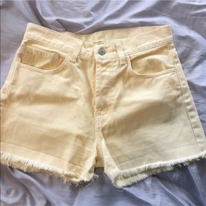 Yellow Brandy Melville shorts